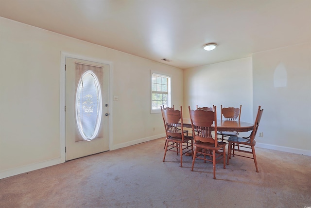 view of carpeted dining room