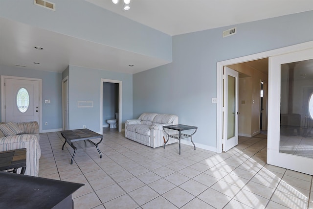 living room with light tile patterned floors