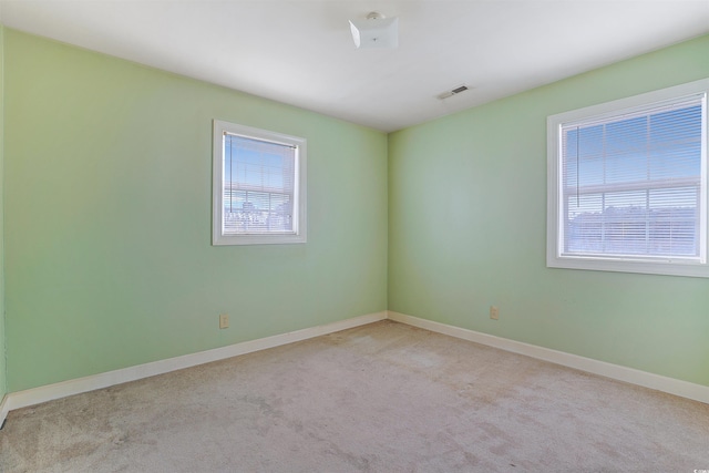 view of carpeted spare room