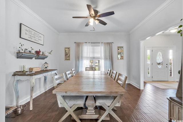 dining space with dark hardwood / wood-style floors, ceiling fan, and ornamental molding