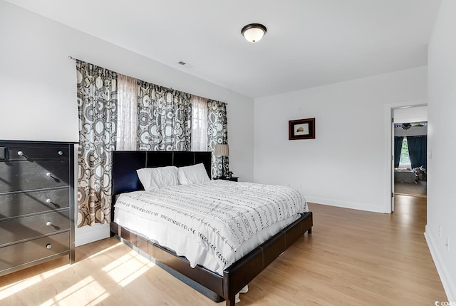 bedroom featuring light hardwood / wood-style flooring