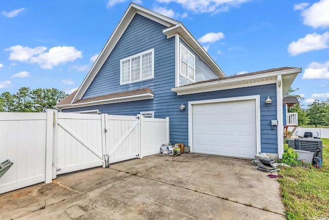 view of home's exterior with a garage