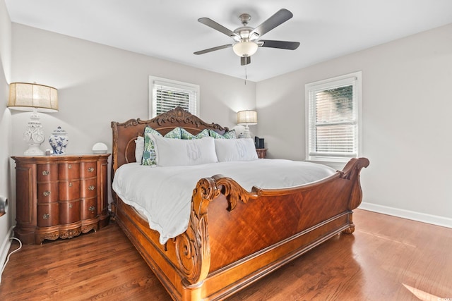 bedroom featuring hardwood / wood-style floors and ceiling fan