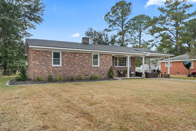 1673 Middleton St, Georgetown, SC 29440 - single story home featuring crawl space, brick siding, a chimney, a patio, and an outdoor hangout area