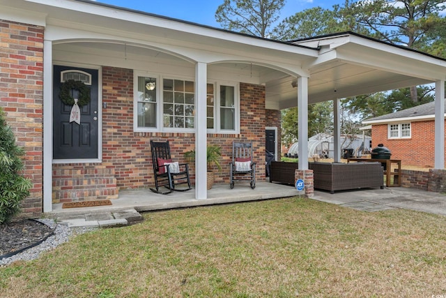 view of patio featuring an outdoor living space and covered porch