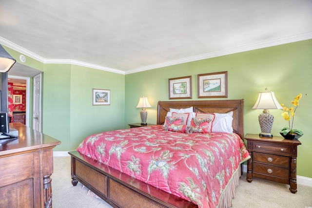 carpeted bedroom featuring ornamental molding