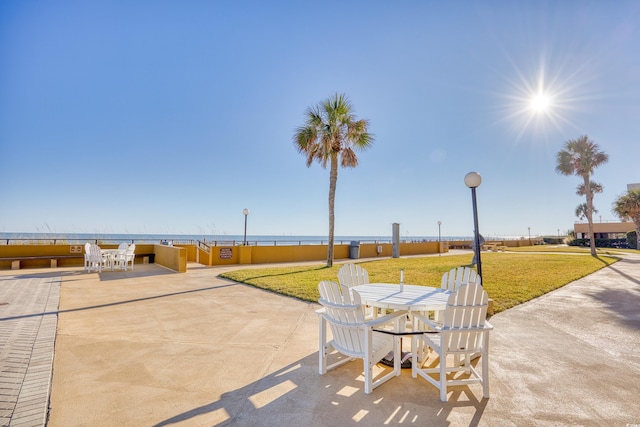 view of patio / terrace featuring a water view