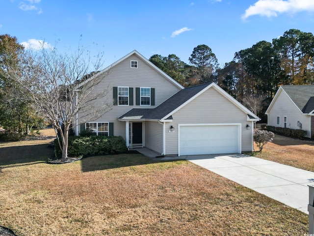 front of property featuring a garage and a front yard