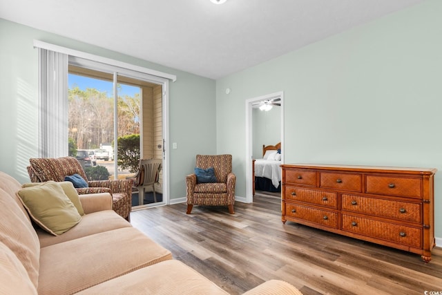 living area with hardwood / wood-style flooring