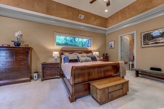 bedroom with connected bathroom, ceiling fan, crown molding, and light colored carpet