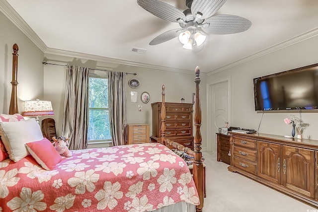 bedroom with ceiling fan, crown molding, and light colored carpet