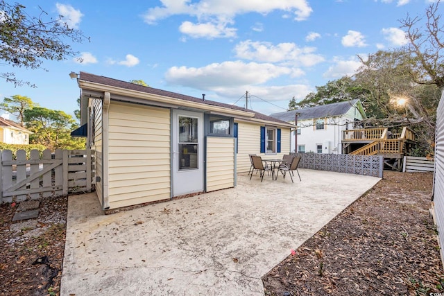 back of property featuring a patio area