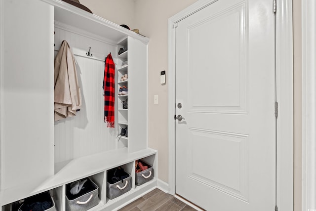 mudroom with wood-type flooring