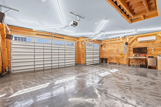 garage featuring a wall mounted air conditioner, electric panel, a garage door opener, and wood walls