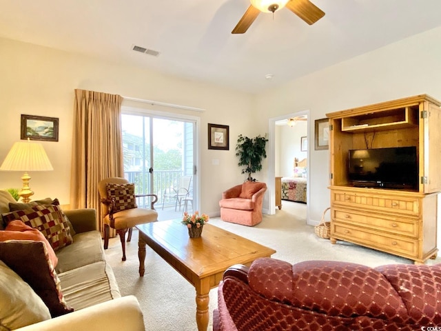 living room with light colored carpet