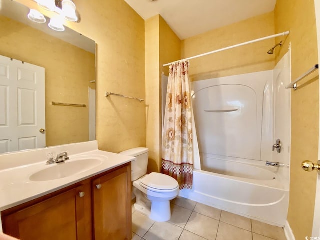 full bathroom with tile patterned floors, vanity, shower / tub combo, and toilet