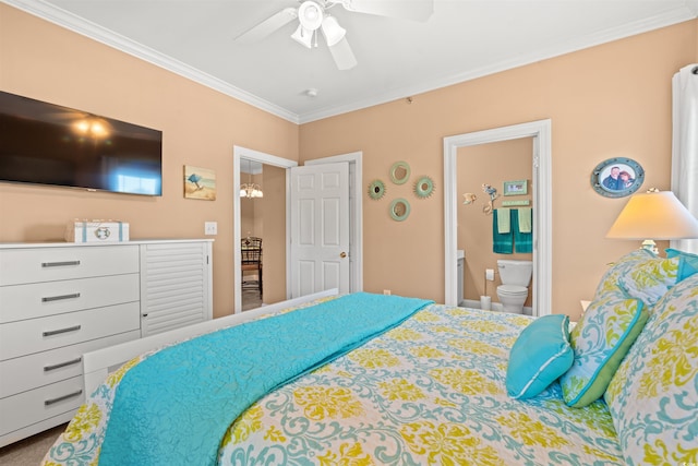 bedroom with ensuite bathroom, ceiling fan, carpet floors, and crown molding
