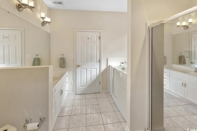 bathroom with vanity, tile patterned floors, and an enclosed shower