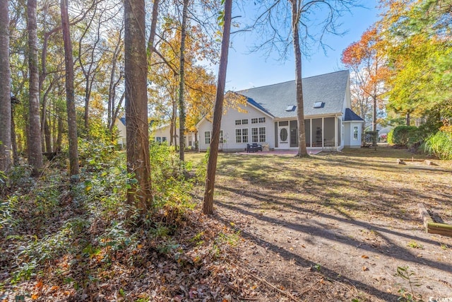 back of house with a patio area