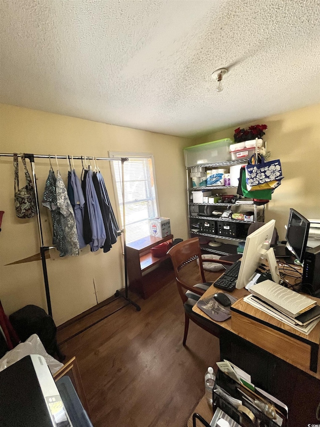 office area featuring a textured ceiling and hardwood / wood-style flooring