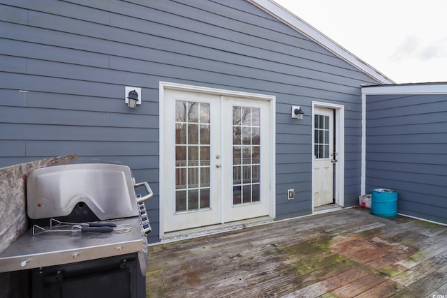 wooden deck with french doors and grilling area