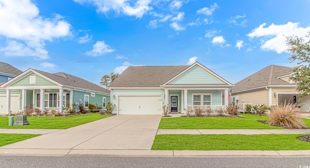 view of front facade with covered porch, concrete driveway, a front lawn, and an attached garage