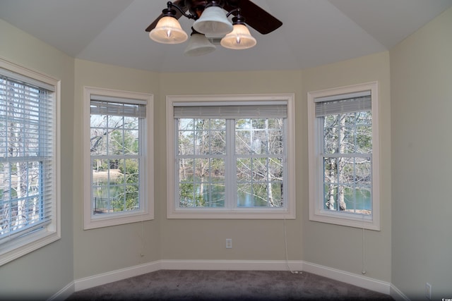 interior space featuring lofted ceiling and plenty of natural light