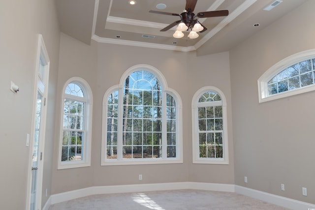 unfurnished room with crown molding, recessed lighting, a raised ceiling, visible vents, and baseboards