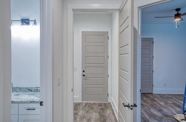 hall featuring hardwood / wood-style flooring