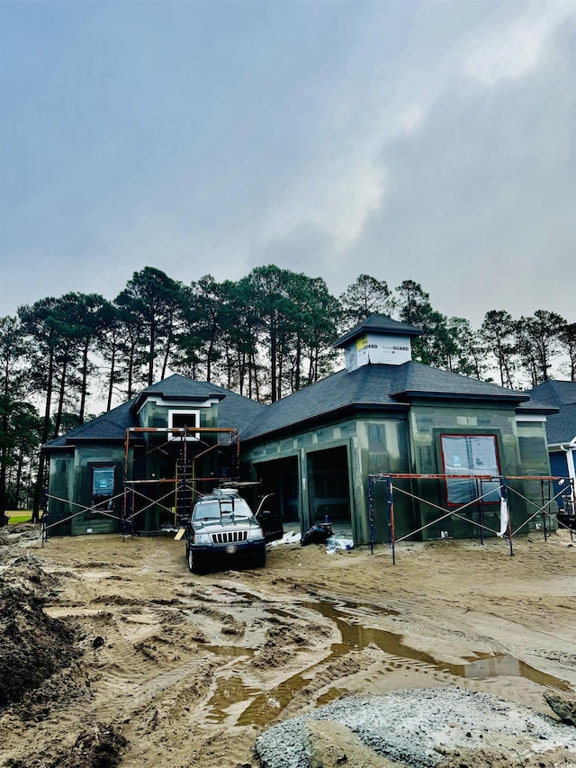 view of front of home featuring a garage