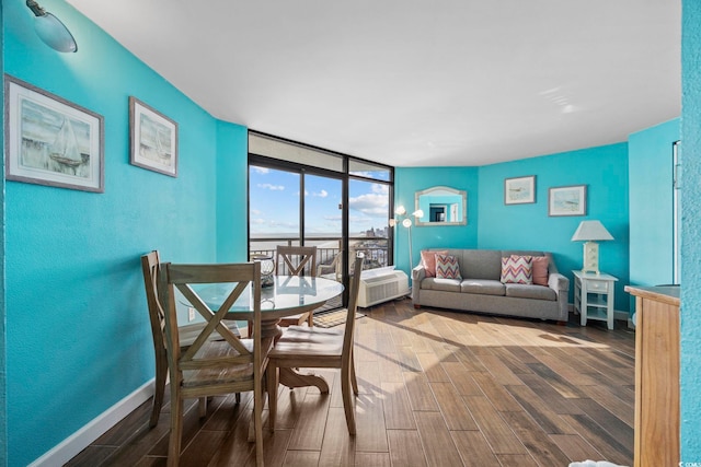 dining space featuring expansive windows