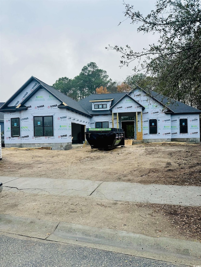 unfinished property with an attached garage