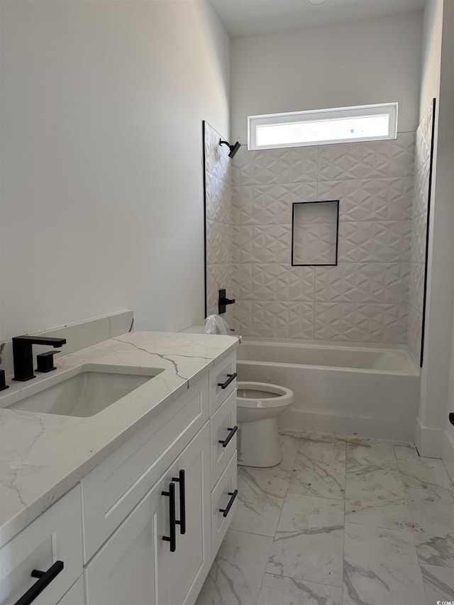 full bathroom featuring marble finish floor, shower / bathing tub combination, vanity, and toilet