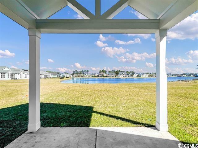 view of yard with a water view