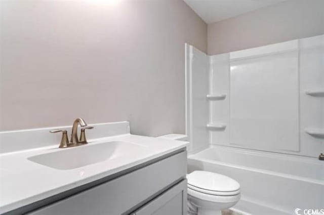 full bathroom featuring vanity, toilet, and tub / shower combination