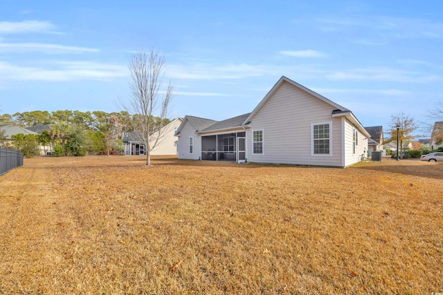 back of property featuring a sunroom