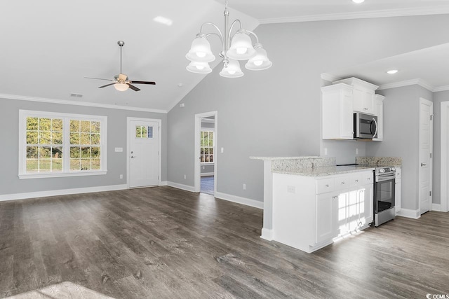 kitchen featuring white cabinetry, stainless steel appliances, light stone countertops, ceiling fan with notable chandelier, and decorative light fixtures