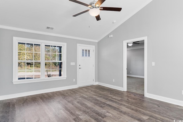 interior space featuring ceiling fan, ornamental molding, dark hardwood / wood-style floors, and vaulted ceiling