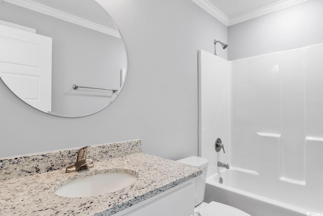 full bathroom featuring vanity, ornamental molding, bathtub / shower combination, and toilet