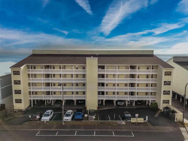 view of building exterior featuring a water view