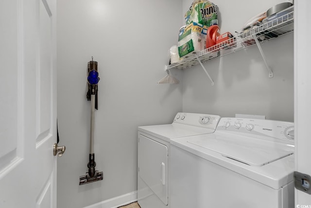 laundry room with washer and dryer