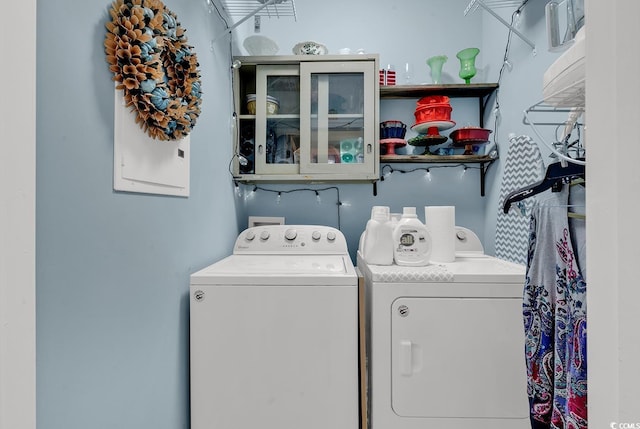 washroom featuring washer and dryer