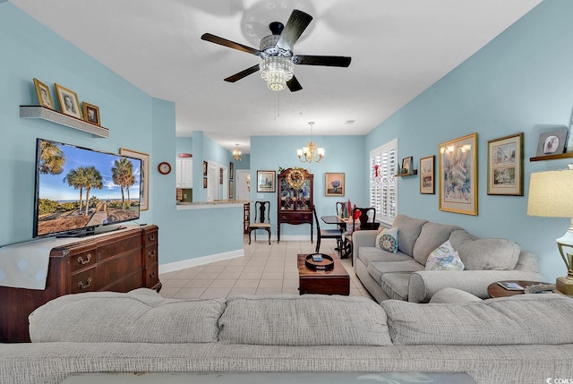 tiled living room with ceiling fan with notable chandelier