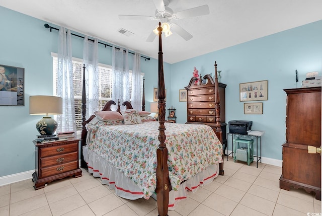 tiled bedroom with ceiling fan