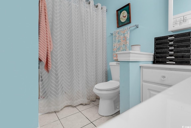 bathroom with tile patterned flooring, a shower with shower curtain, and toilet