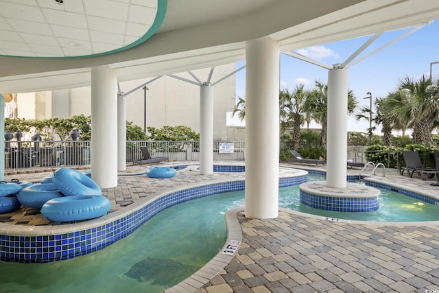 view of pool featuring a patio