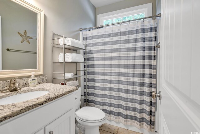 613 Lee Ave, Murrells Inlet, SC 29576 - bathroom featuring vanity, toilet, tile patterned flooring, and a shower with curtain