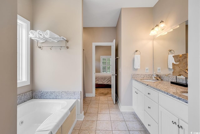 613 Lee Ave, Murrells Inlet, SC 29576 - ensuite bathroom featuring double vanity, plenty of natural light, a jetted tub, and tile patterned floors