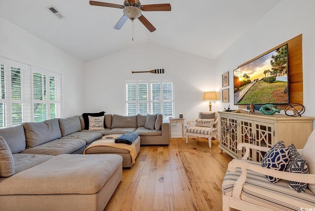 613 Lee Ave, Murrells Inlet, SC 29576 - living area with a ceiling fan, lofted ceiling, and light wood-type flooring