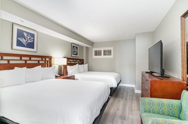 bedroom featuring light hardwood / wood-style floors